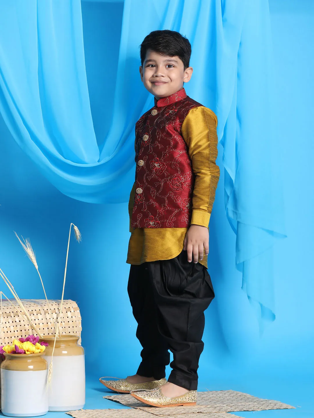 Vastramay Boy's Maroon Embroidered Nehru Jacket With Mustard Kurta And Black Dhoti Set