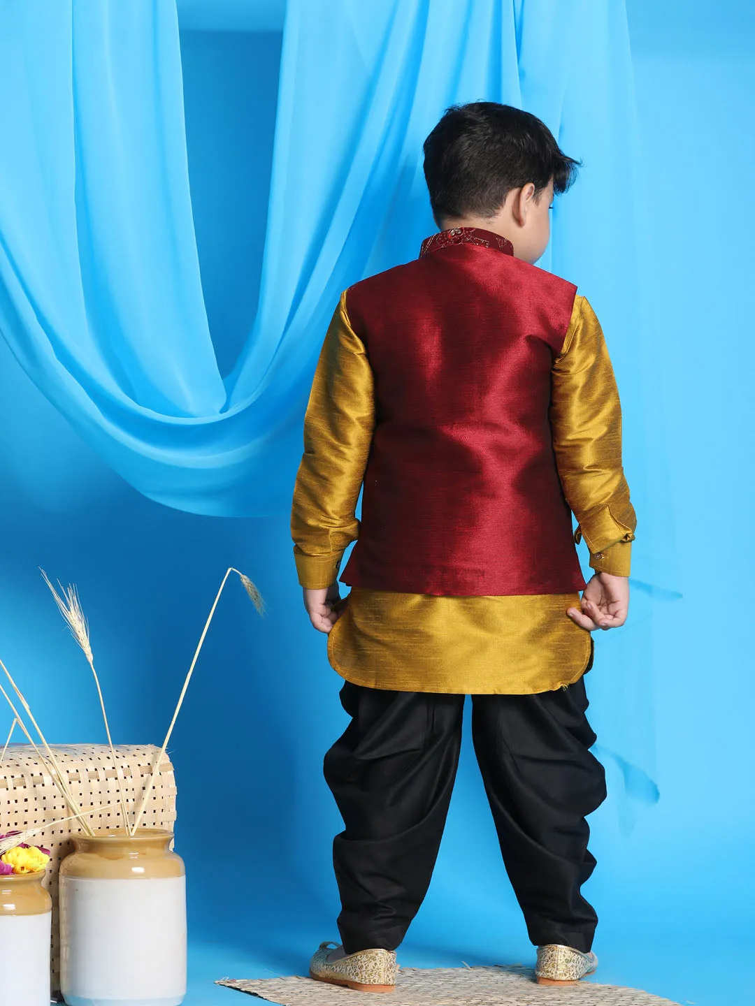 Vastramay Boy's Maroon Embroidered Nehru Jacket With Mustard Kurta And Black Dhoti Set